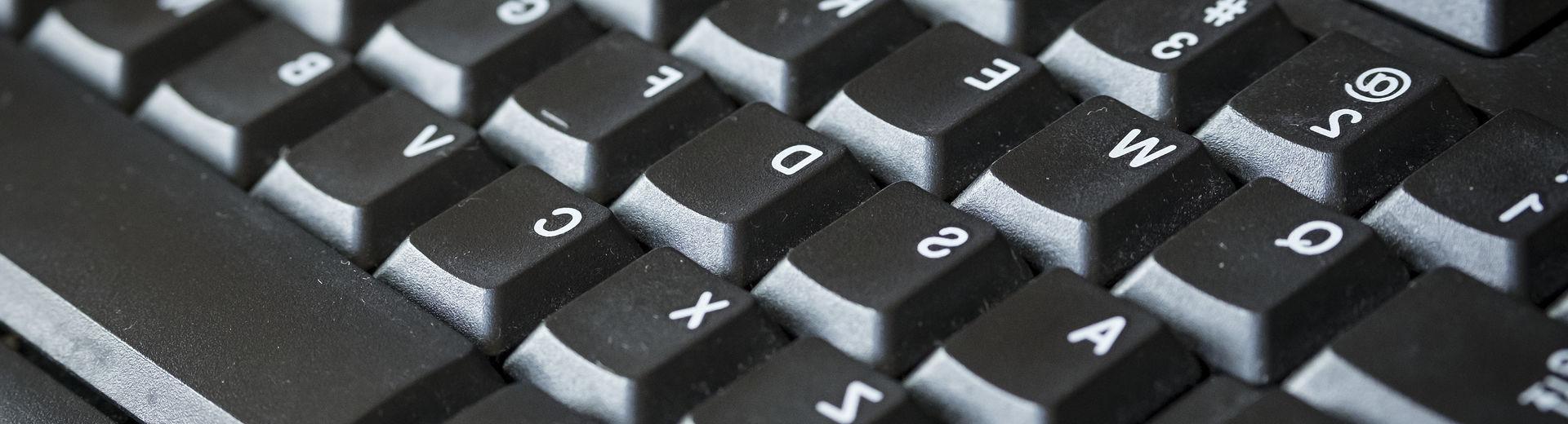 A close-up black computer keyboard.